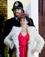 Trevor Goldstein as policeman, Mary Plazas as Nelly in Pagliacci
